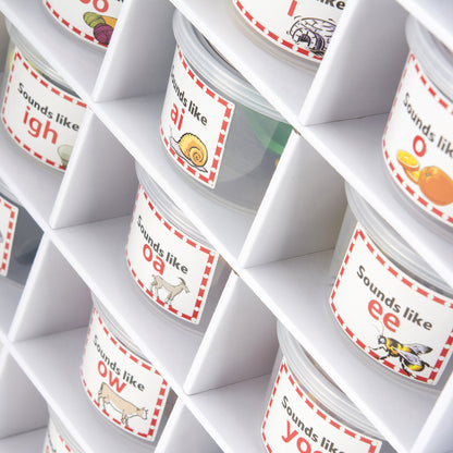 A variety of spelling and phonics tubs such as sounds like "EE" or "O ."