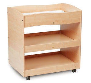 Lightly stained wooden mobile baby changing unit with storage undeneath.